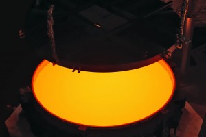 Opening of the ELT M2 ZERODUR® blank mould containing the still very hot ZERODUR® glass at first annealing at the SCHOTT 4-metre blank annealing facility in Mainz, Germany in May 2017. The completed mirror will be 4.2 metres in diameter and weigh 3.5 tonnes. It will be the largest secondary mirror ever employed on a telescope and also the largest convex mirror ever produced.